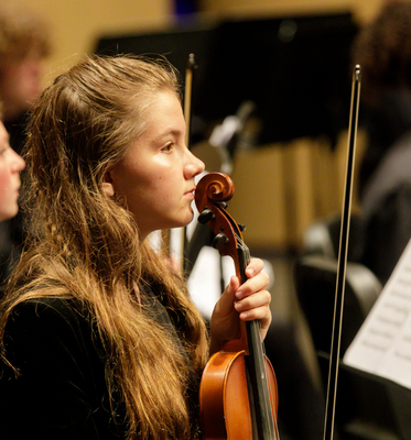 Audition_photo youth girl in orchestra holding instrument