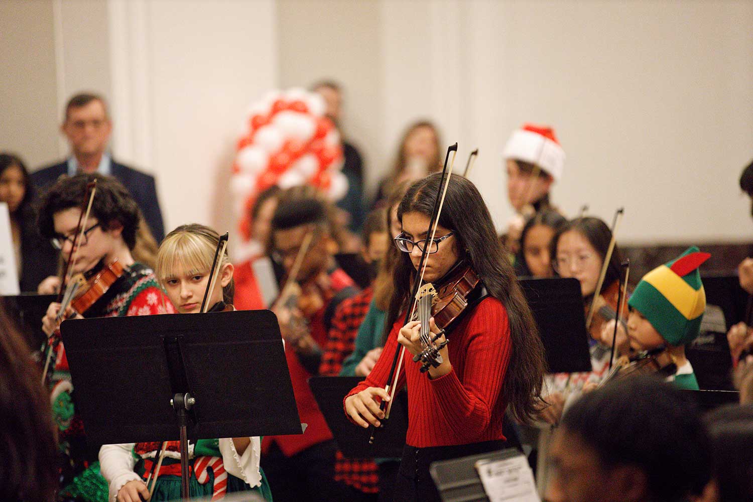 children performing in orchestra